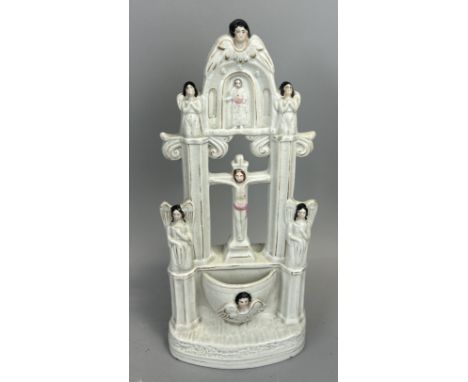 A 19TH CENTURY STAFFORDSHIRE CERAMIC FONT48cm H
