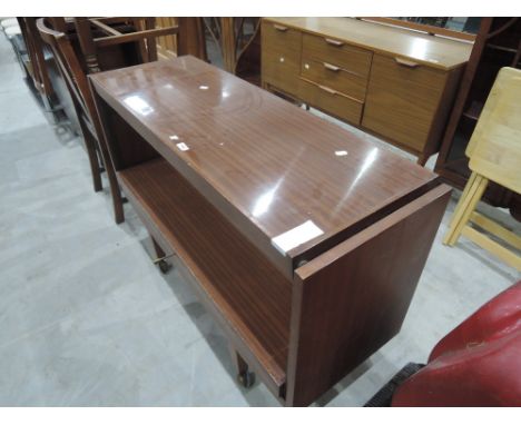 A vintage metamorphic buffet/serving table