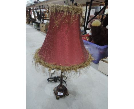 A modern period style table lamp