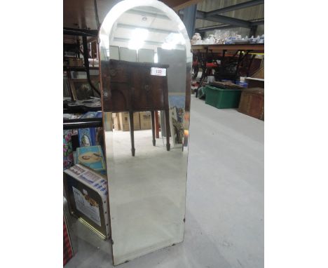 A vintage arched mirror