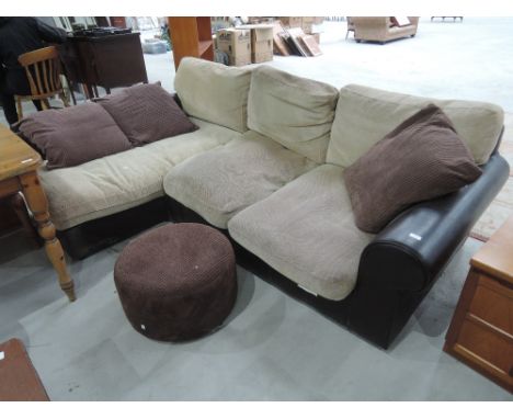 A modern corner settee and pouffe