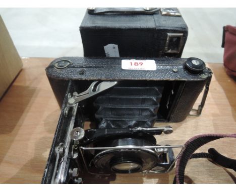 A Vintage Ensign Carbine F22242 with Mulchro shutter and a vintage Crown camera