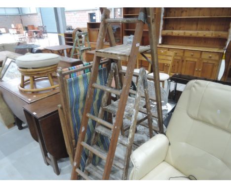 Two sets of vintage step ladders