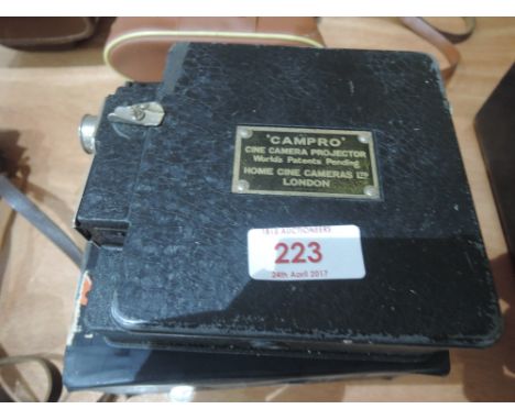 A Campo camera and projector with box and instruction