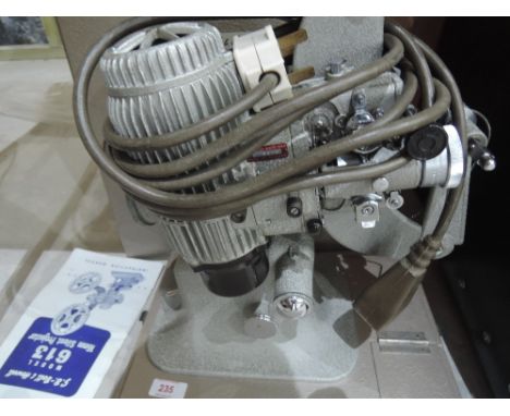 A Bell & Howel 16mm silent projector boxed with instruction manual
