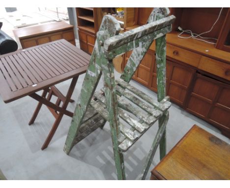 A set of vintage wooden stepladders 