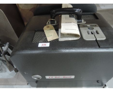 A Bell and Howel Model:626 16mm sound on film projector and Bell & Howel speaker boxed with instruction book