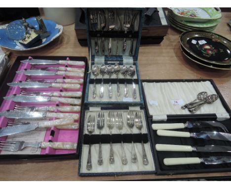 A selection of cased vintage flatware