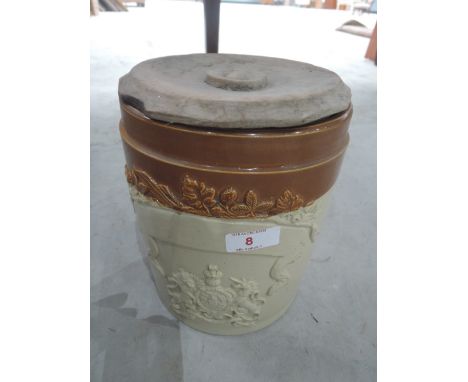 A vintage earthenware jar, having armorial crest