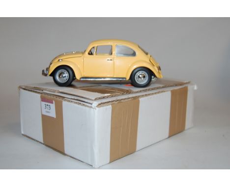 A Franklin Mint diecast model of a 1957 Volkswagen Beetle