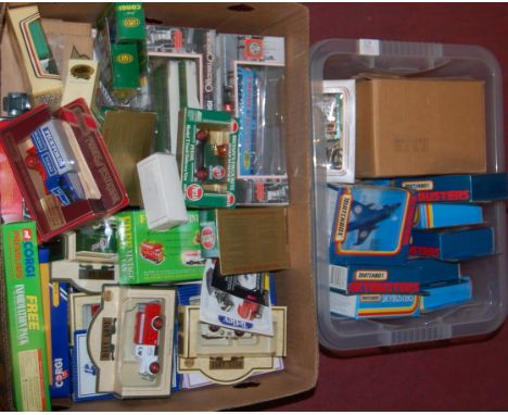 Two boxes of assorted boxed modern issue diecast toy vehicles to include Matchbox Skybusters, Harrier Jets, Lledo Model T For