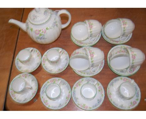 A Royal Worcester six place setting tea and coffee service, in the English Garden pattern