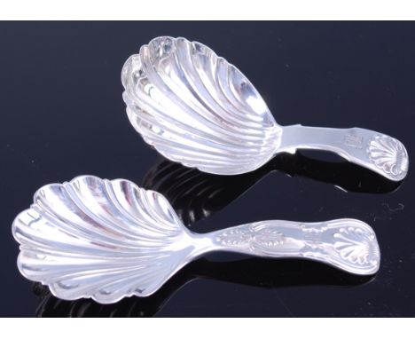 A George IV silver caddy spoon having shell shaped bowl London 1827 together with one other similar example in the Kings patt