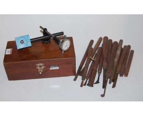 A boxed Mercer dial gauge, model No.95011581; together with a selection of wooden hand tools 