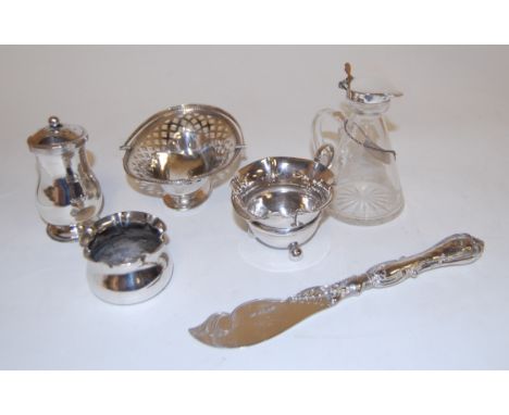 A George V pierced silver bonbon dish by William Hutton & Sons Ltd, together with a silver mounted glass whisky tot, a George