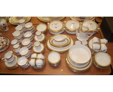 An extensive Paragon part tea and dinner service, in the Athena pattern, on a plain cream ground with gilt decoration, to inc