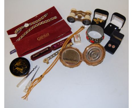 A collection of miscellaneous items to include; pair of opera glasses, ladies powder compact, pair of ladies silver and cubic