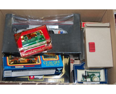 A collection of boxed modern issue diecast toy vehicles, to include Matchbox Superkings race cars, Burago Mercedes Benz 300SL