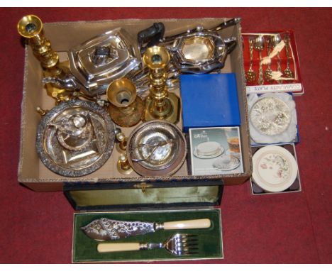 A box of miscellaneous metalware to include; silver plated three piece tea service, pair of turned brass candlesticks, cased 