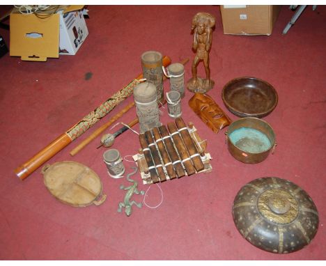 A collection of assorted tribal figures and instruments, to include an Erhu and didgeridoo etc 