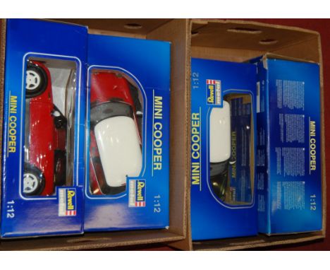 Four boxed Revell 1.12 scale model Mini Coopers