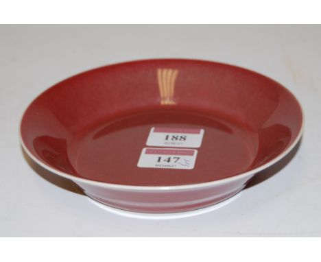 A Chinese copper red porcelain saucer-dish, in the Ming style, having four character mark verso, dia. 15.5cm   Condition Repo