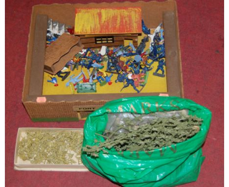 A large collection of assorted plastic soldiers, together with a model of a fort, and various other plastic figures of soldie