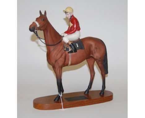 A Beswick figure of Red Rum, Brian Fletcher up, model No. 2511, bay matt finish on wooden plinth   Condition Report / Extra I