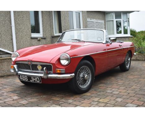 A 1963 MG B roadster, registration number 488 JHO, chassis number GHN3 20137, engine number 18GUH/20428, Tartan red.    Intro