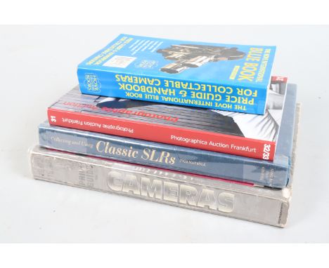 Photographic Books, a paper back, 1992-1993 8th edition Mckeown's price guide, a 14th edition of The Hove International Blue 