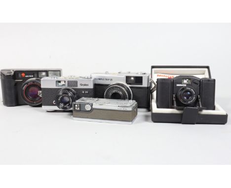 Compact Cameras, a Rollei B 35,shutter working, meter responsive, elements G, a Minox 35 EL, not battery tested, shutter erra