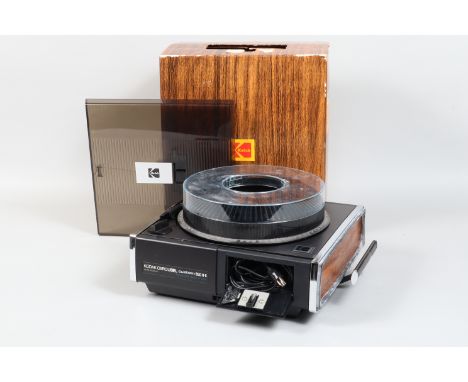 A Kodak Carousel Custom 850 H K Auto Focus Slide Projector, with 102-152mm f/3.5 Ektanar C projection lens, elements G, with 