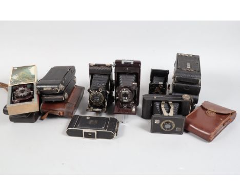 A Tray of Folding Cameras, including a Kodak Jiffy, a Soho Cadet, a Kodak Autographic Vest Pocket, a Voigtlander Bessa (P), a