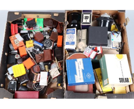 Two Trays of Camera Accessories,  including, light meters, metal 35mm film canisters, viewfinders, darkroom equipment, cerami