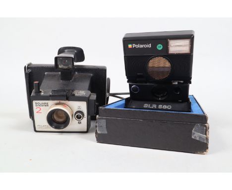 A Polaroid SLR 680 Camera, a Polaroid folding SLR AF instant camera, some discolouration to body, with maker's box and instru