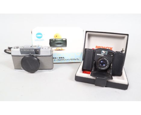 Compact Cameras, comprising a Minox 35 EL with maker's presentation box and instructions, an Olympus Pen EE-2 half frame came