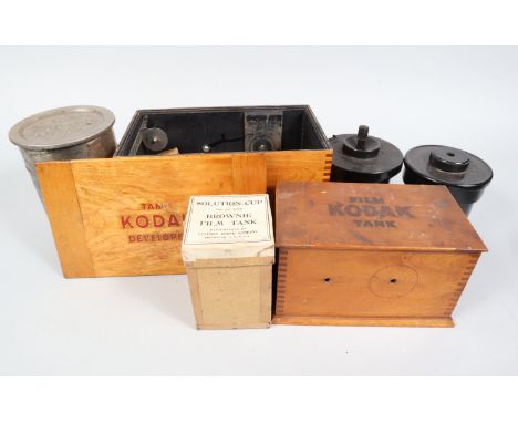 Two Kodak Developers, a 3½ Model B-2, with metal tank, spool and turning handel, G, with six developer powders in maker's box