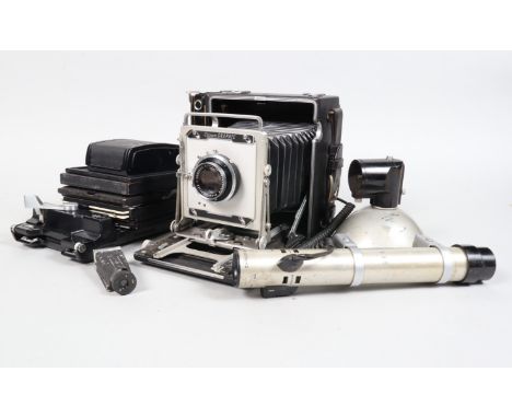 A Graflex Pacemaker Crown Graphic Press Camera Outfit, 5 x 4in format, serial no 913162, a Kalart rangefinder, body F, signs 