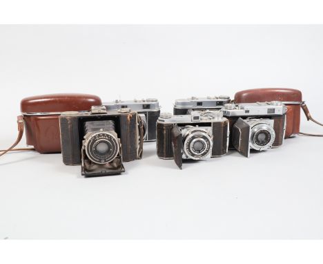 A Group of Kodak Folding Cameras, including a Kodak Duo 620, shutter working, body F, wear to leatherette, elements F, a Reti