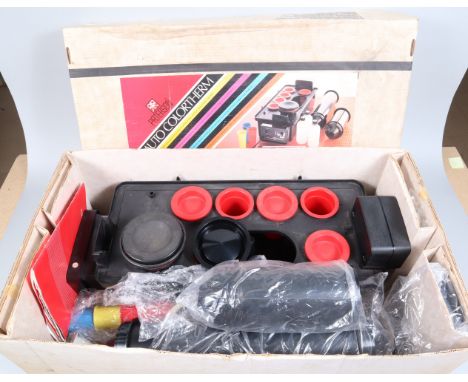 A Paterson Auto Colortherm Processor, with processor unit,drums, measuring cups, hose, separators, other accessories, manual,