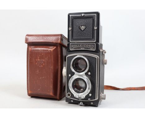 A Rolleicord IV 120 Film TLR Camera, serial no 1355723, body F-G, some paint losses to back and slight corrosion, spotting to