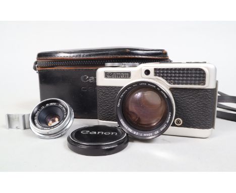 A Canon Demi C Half Frame Camera, serial no 113341, body P-F, storage deterioration, shutter working, meter failing, with Can