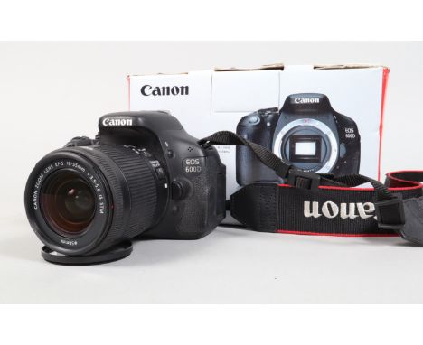 A Canon 600D DSLR Camera, powers up, shutter working, flash working, auto focus working, otherwise untested, body G, with EFS