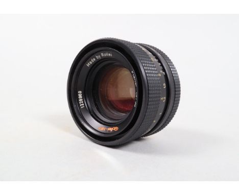 A Rollei HFT 50mm f/1.8 Planar Lens, serial no 1228969, barrel G, light wear, elements G, haze to edge of rear element