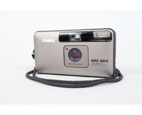 A Konica Big Mini BM-201 Compact 35mm Camera serial no 5030182, a Konica 35mm f/3.5 lens, powers up, shutter and flash fire, 