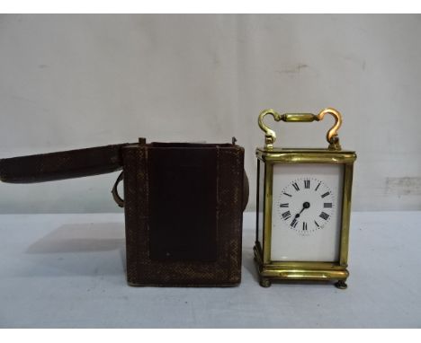 A cased brass 19th century carriage clock