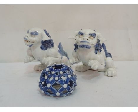 A 20th century Chinese ceramic kylin and ball