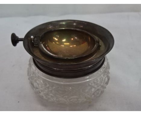 An Edwardian silver and cut glass revolving sugar bowl