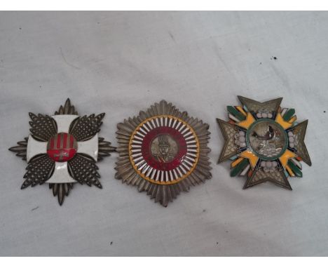 Three enamel and metal Chinese buckles