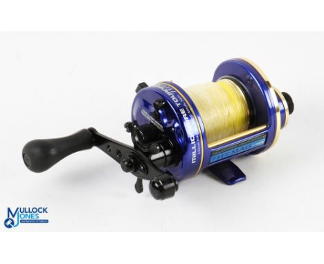 Daiwa Millionaire Tournament 7HT Mag multiplier, large counter balanced rubber handle, large side tensioner, runs very well. 